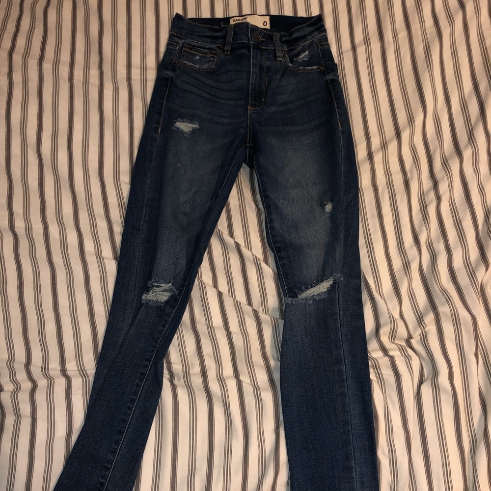 garage dark wash ripped jeans